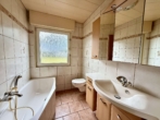 Badezimmer EG - Charmantes freistehendes Einfamilienhaus mit Wintergarten und großem Gartenparadies in ruhiger Lage