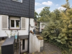 Rückansicht - Doppelhaushälfte mit schönem Garten in Alstaden – Garage, Fernwärme & Entwicklungspotenzial