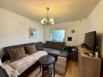Wohnzimmer - Doppelhaushälfte mit schönem Garten in Alstaden – Garage, Fernwärme & Entwicklungspotenzial