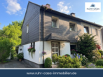 Außenansicht - Doppelhaushälfte mit schönem Garten in Alstaden – Garage, Fernwärme & Entwicklungspotenzial