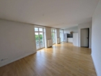 Wohnzimmer - Attraktive 3-Zimmer-Wohnung mit 2 Balkonen und traumhaftem Ruhrblick in Mülheim